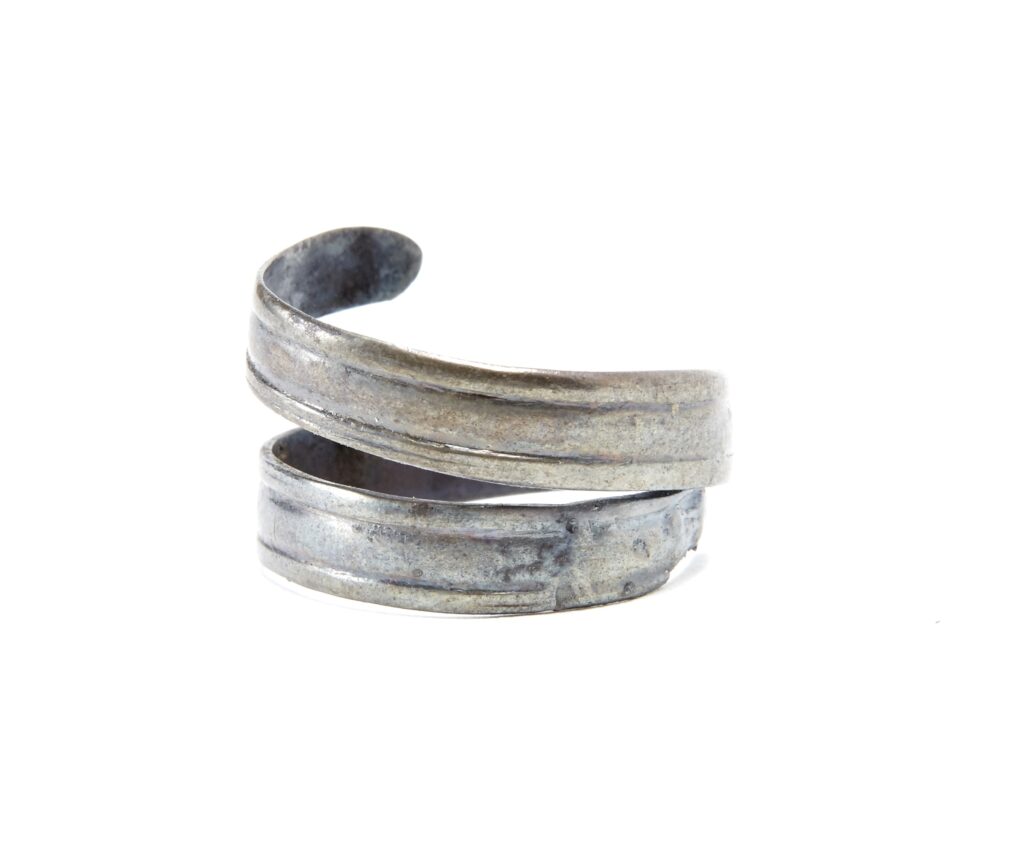 Silver finger ring in the shape of a snake.