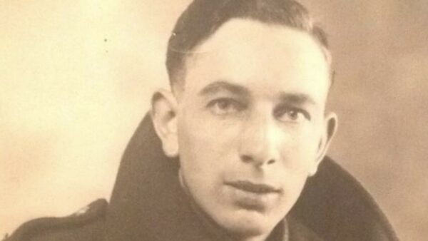 sepia image of a smartly dressed young man, looks in about his twenties