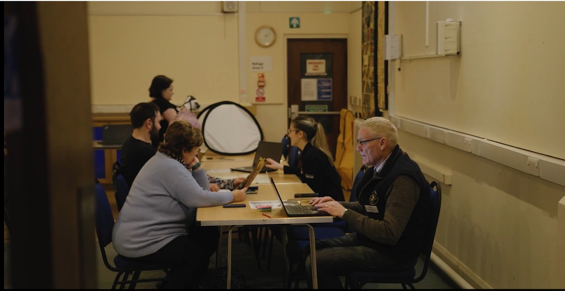 volunteers working in the community gallery