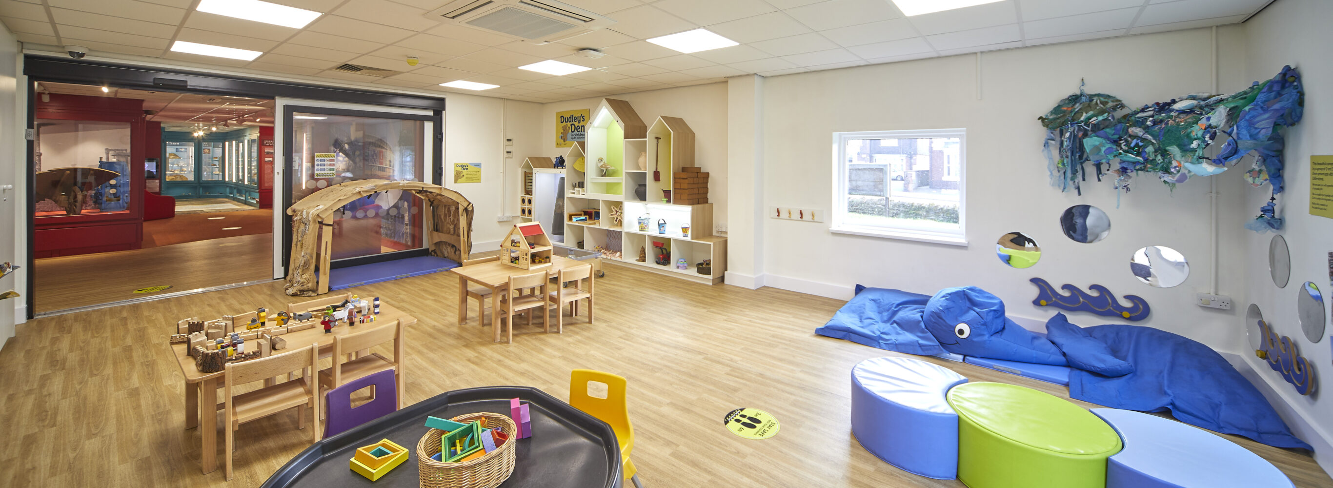 Dudley's Den - tuff tray to the left and bean bags to the right