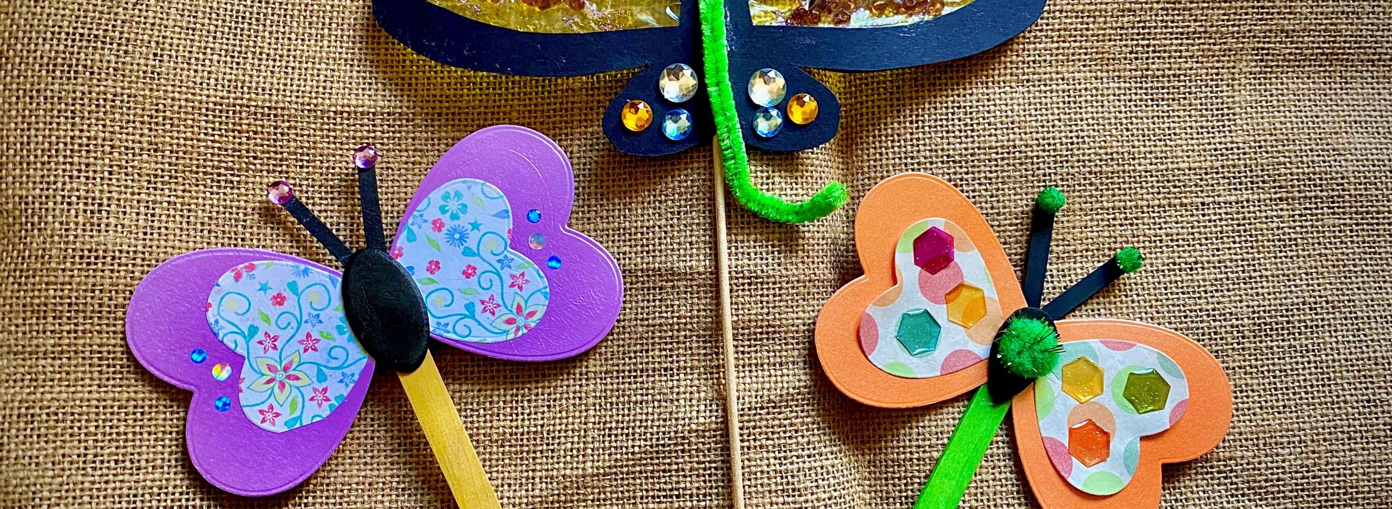 butterflies made from pipe cleaners and lollypop sticks
