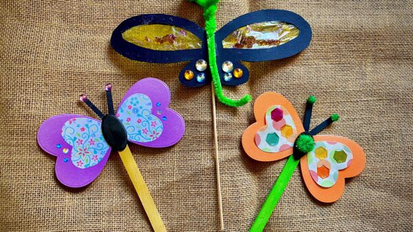 butterflies made from pipe cleaners and lollypop sticks