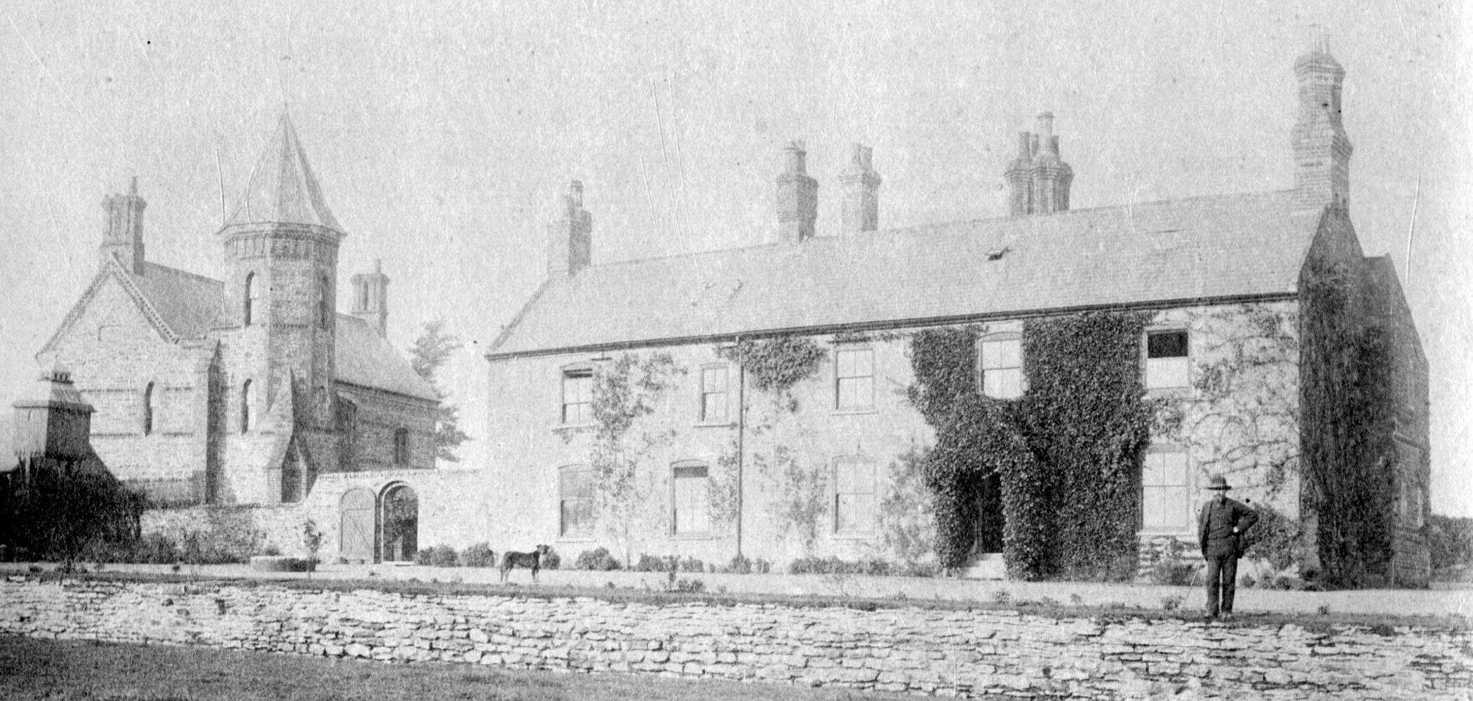 black and white photo of a large house