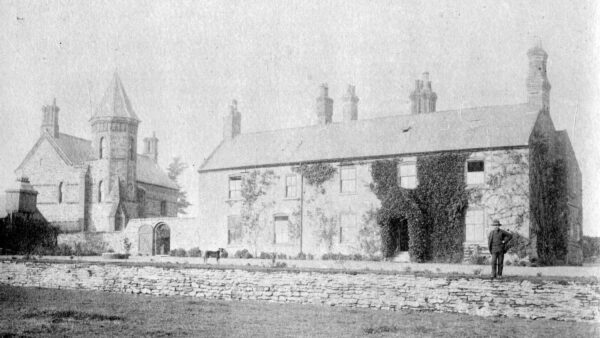 black and white photo of a large house